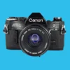 Canon® Canon AE-1 Black 35mm SLR Film Camera With Canon Prime Lens -Camera Promotion Store canon ae 1 black 35mm slr film camera with canon prime lens 1