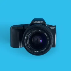 Minolta Dynax SPxi Automatic 35mm SLR Film Camera W/ Auto Zoom Lens