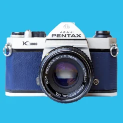 Pentax K1000 Navy Leather Vintage SLR 35mm Film Camera With Pentax F/2 50mm Prime Lens.